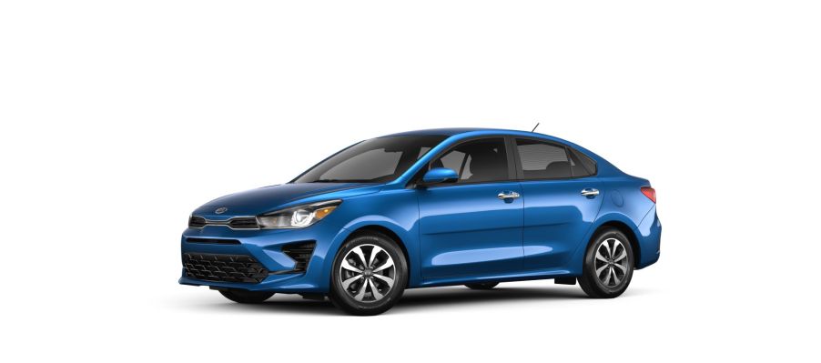 A blue 2021 Kia Rio sedan on a solid white background and floor.