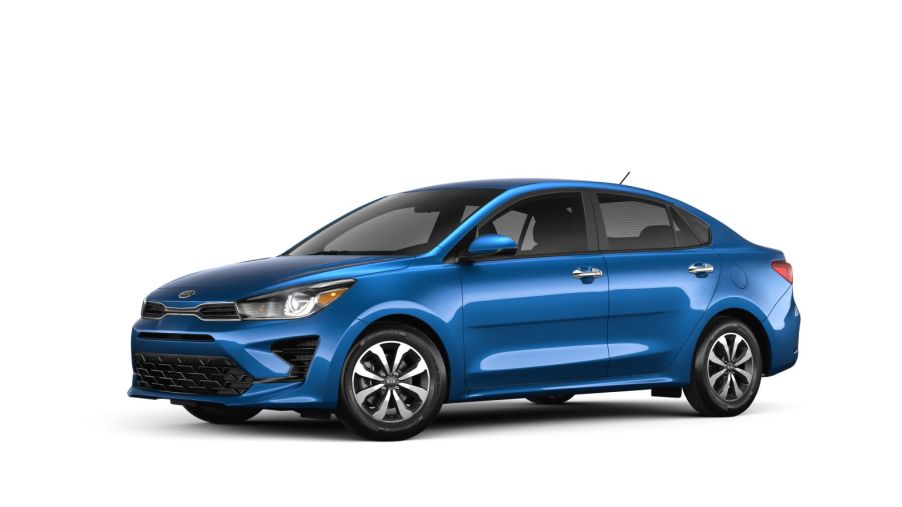A blue 2021 Kia Rio sedan on a solid white background and floor.