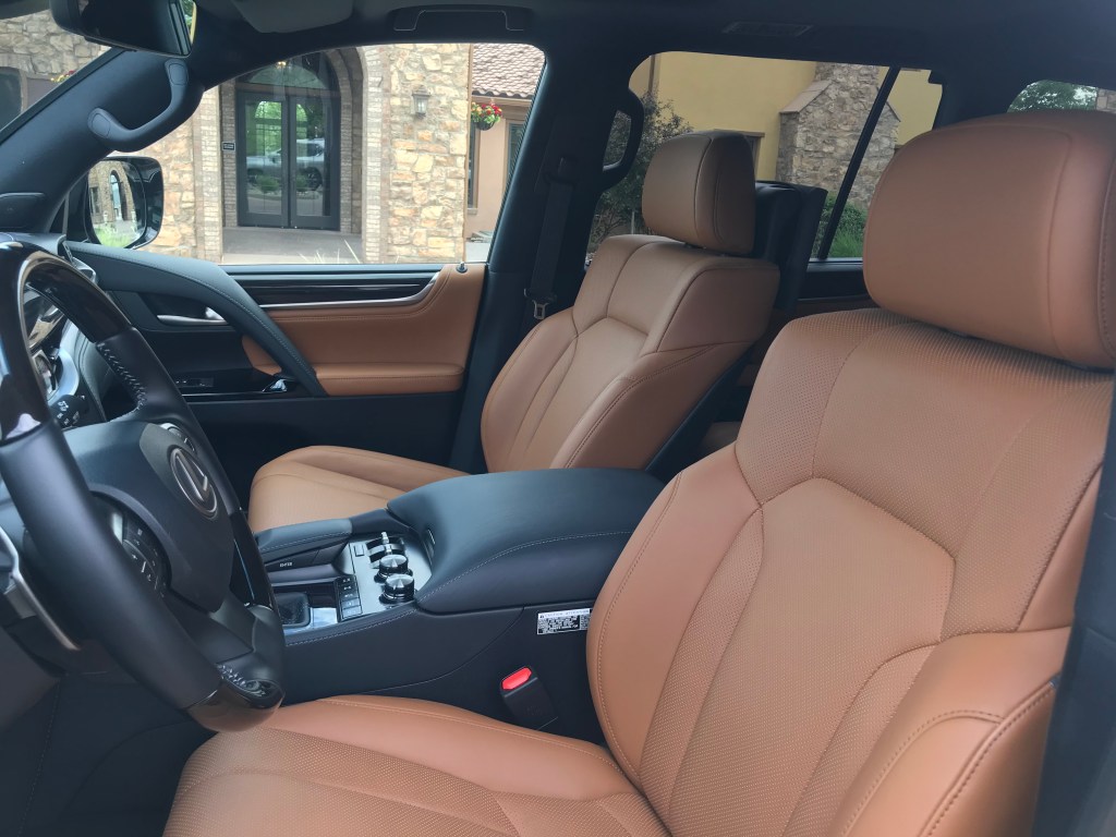 Front seat shot of the 2021 Lexus LX 570 as it sits in a parking lot driveway for our full review.