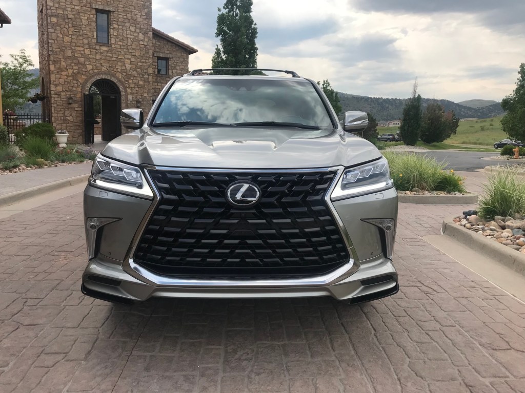 Front shot of the 2021 Lexus LX 570 as it sits in a parking lot driveway for our full review.