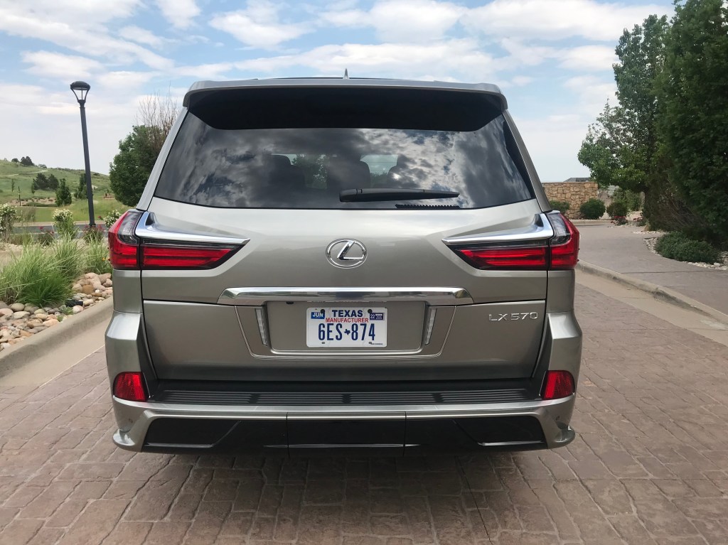 Rear shot of the 2021 Lexus LX 570 as it sits in a parking lot driveway for our full review.