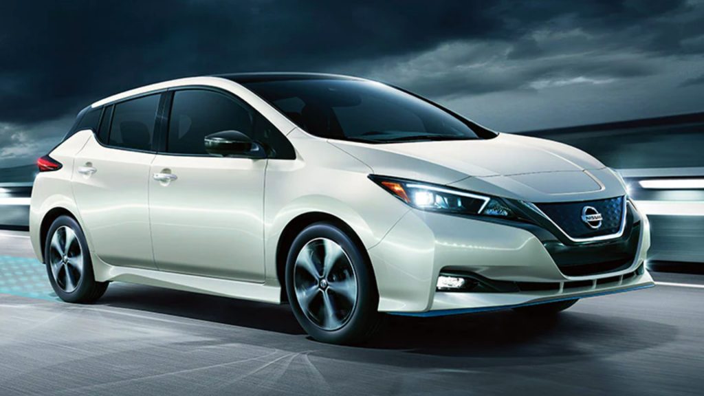 A white 2021 Nissan LEAF electric vehicle.