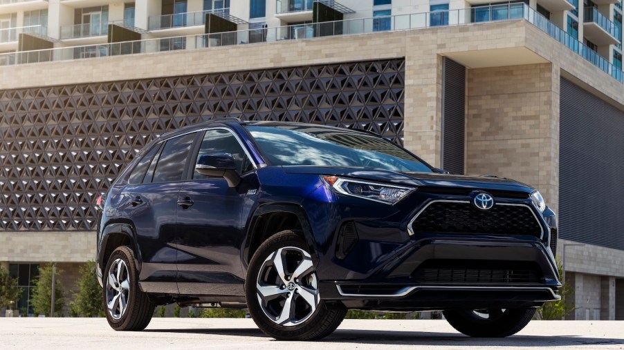 A blue 2021 Toyota RAV4 Prime parked, the 2021 Toyota RAV4 Prime is one of the best AWD SUVs of 2021