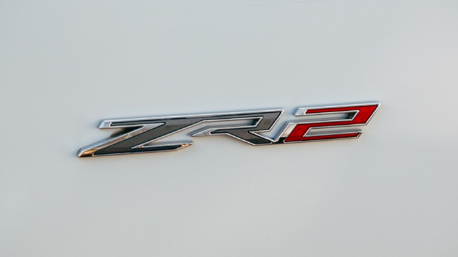 A close-up of the badge on a white 2022 Chevrolet Silverado ZR2