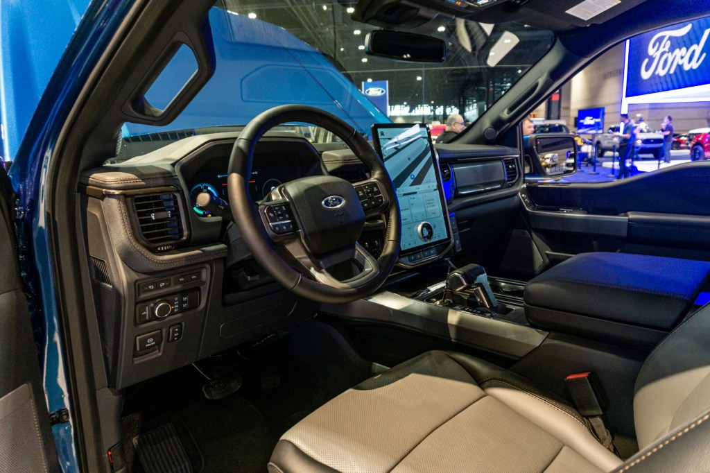 The driver's side front interior of a 2022 Ford F-150 Lightning at the 2021 Chicago Auto Show