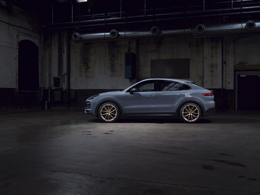 Porsche Cayenne parked inside a warehouse