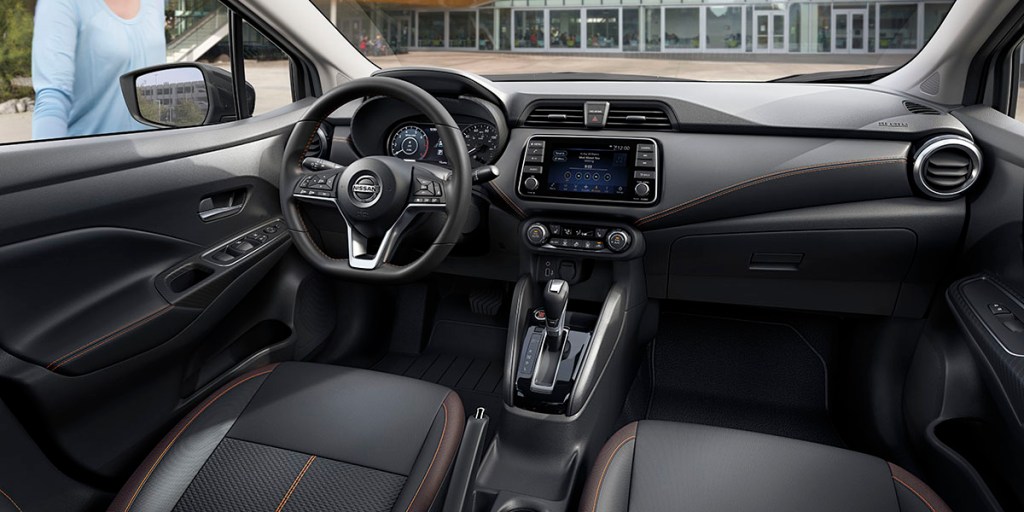 the interior view of the 2021 Nissan Versa compact car with sport cloth trim. 