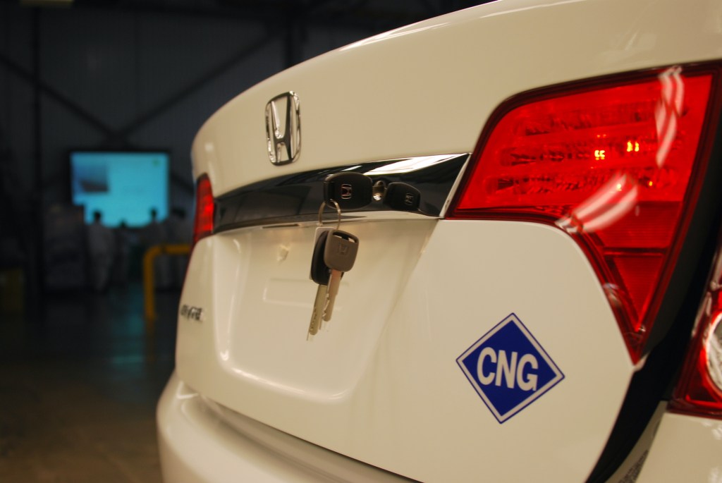 Keys sit in the trunk of a recently assembled compress natural gas-powered Civic GX