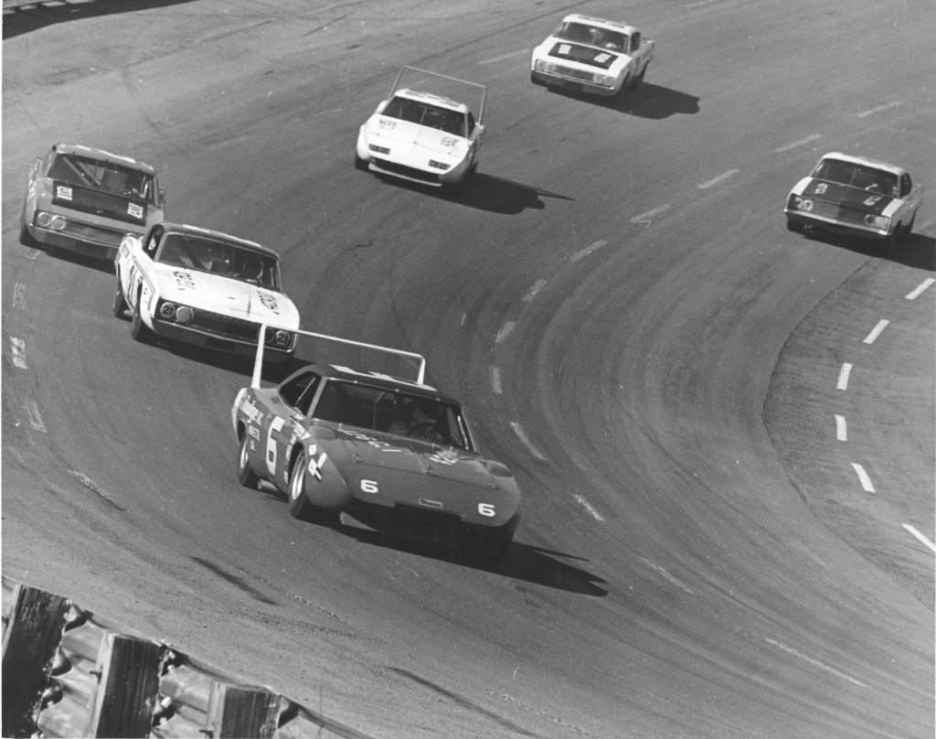 A Dodge Daytona leads the field during a NASCAR Grand National race in 1970