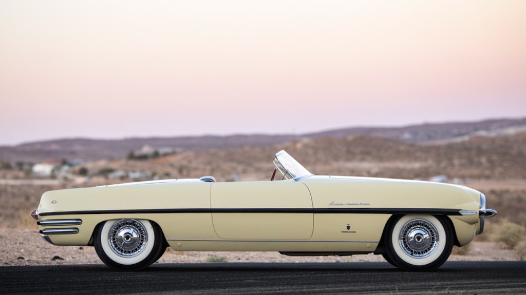 1954 Dodge Firearrow II parked at sunset