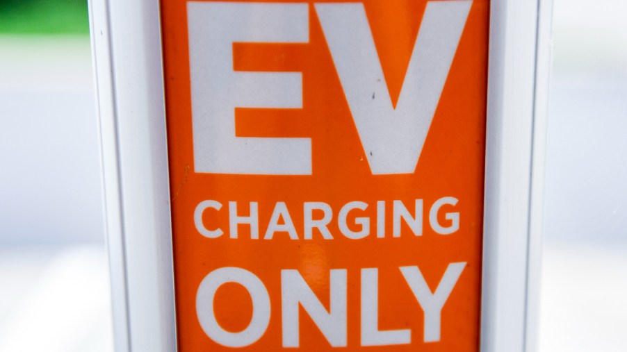 A sign that reads "EV Charging Only" at a ChargePoint vehicle (EV) charging station at the Homewood Suites by Hilton hotel in Spring Township, PA Wednesday morning July 21, 2021.