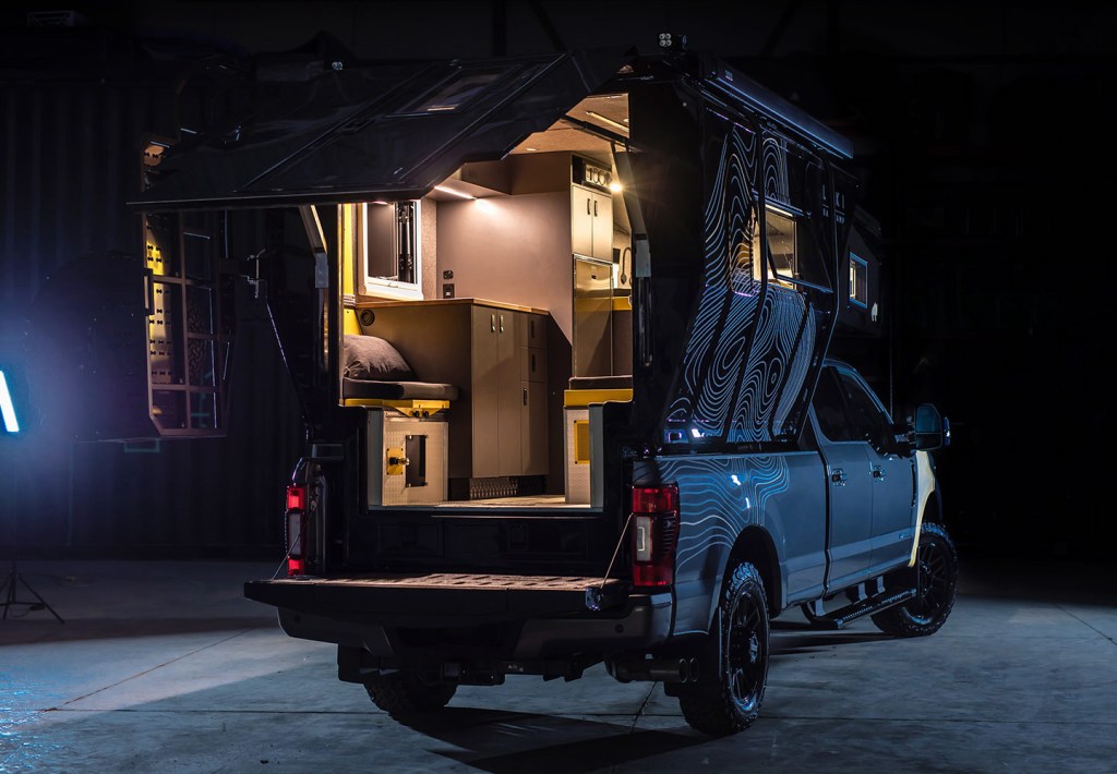 Truck camper opened up at night