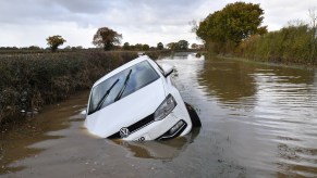 A flooded car in a river in England