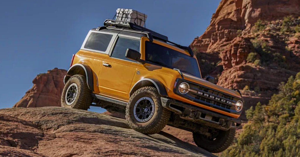 A yellow Ford Bronco. 