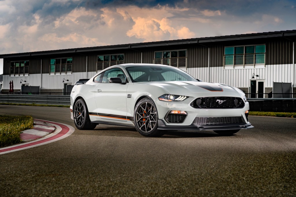 A white Ford Mustang on the track, the Ford Mustang is the fastest car under $30K