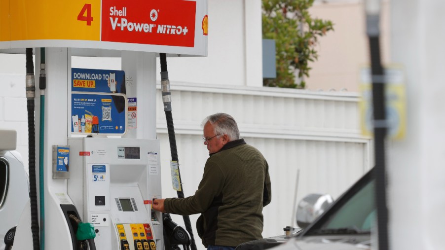 A customer prepares to pump gas at a Shell station
