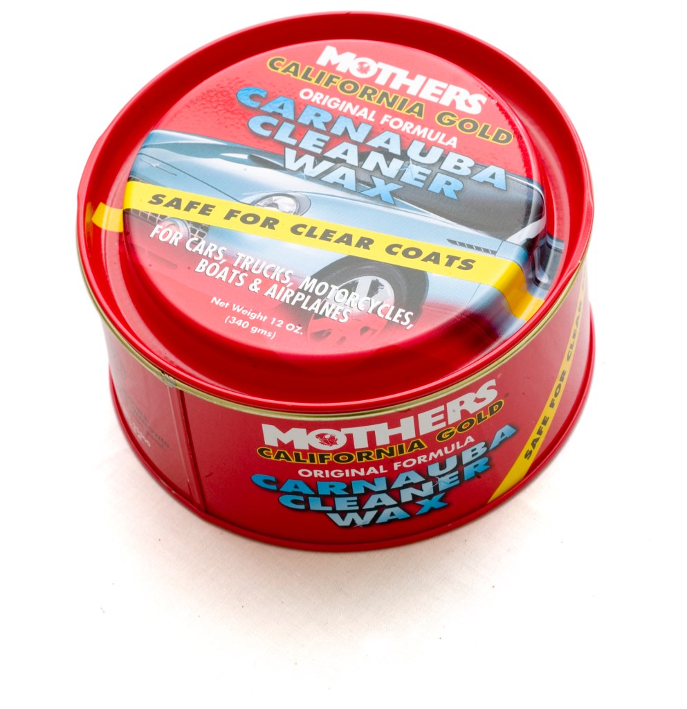 A red can of Mother's car wax