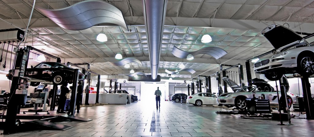 Car recalls are often performed in a dealership shop like this one, with pristine white floors