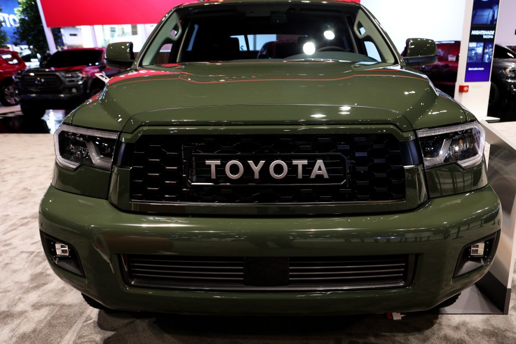 a 2020 army green Toyota Sequoia SUV on display is the biggest Toyota SUV in the lineup 