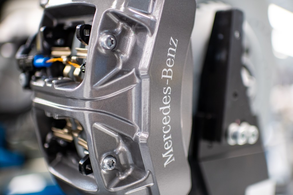 The brake caliper of a new Mercedes-Benz in the factory