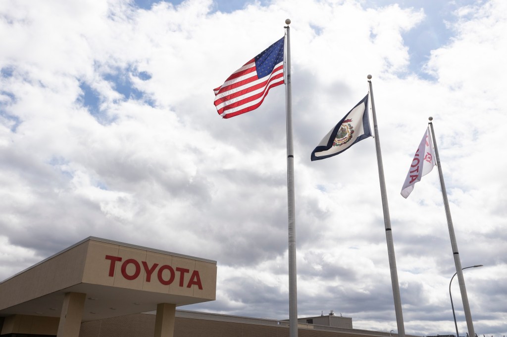 The Toyota plant in West Virginia, with the brand's flag next to the American flag