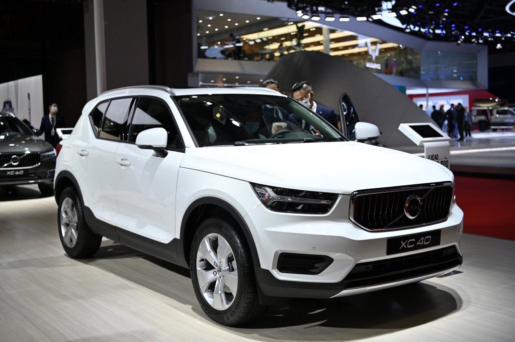 a white 2021 Volvo XC40 at an auto show on display 