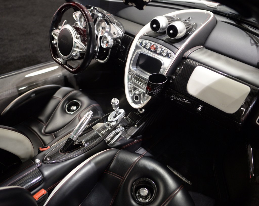 The beautiful but weird interior of the Pagani Huayra, covered in milled aluminium and carbon fiber