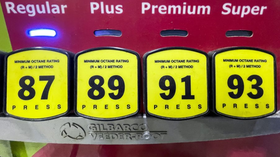 Gas prices are displayed at a pump