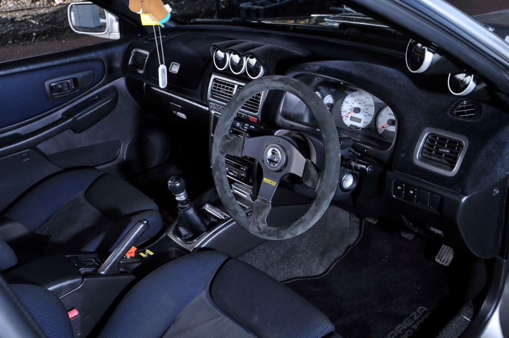 The interior of a modified Subaru WRX.