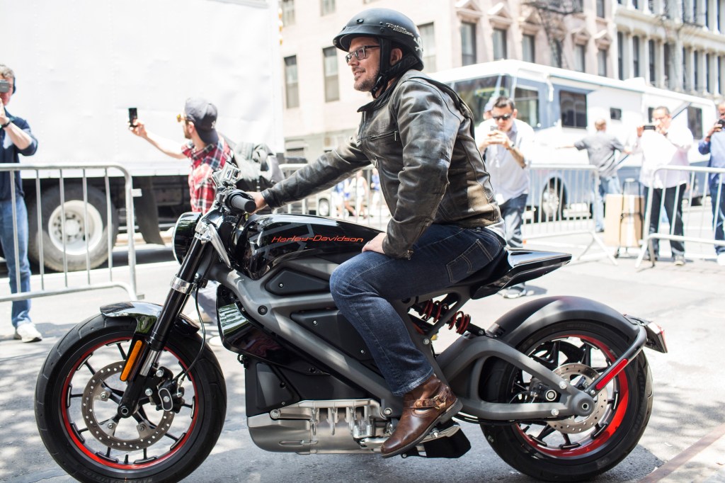 A man sits on Harley' latest electric motorcycle: the Livewire