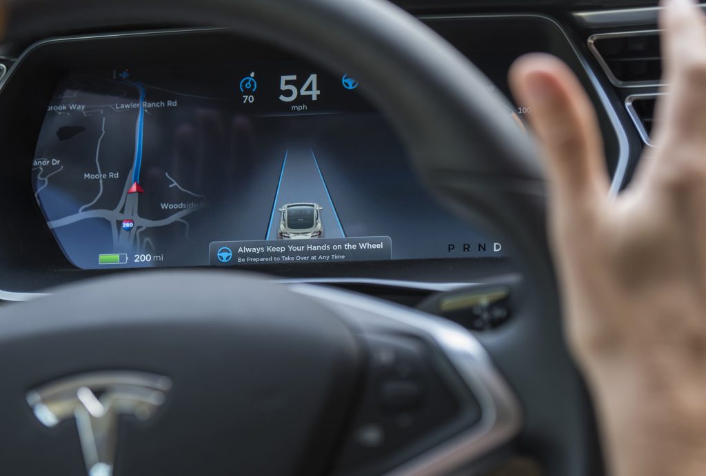 The display of a Model S sedan while Autopilot is active.