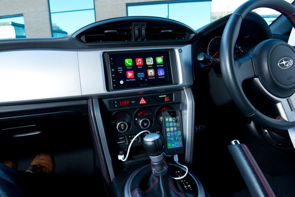 The BRZ's interior, complete with manual transmission and Apple Carplay