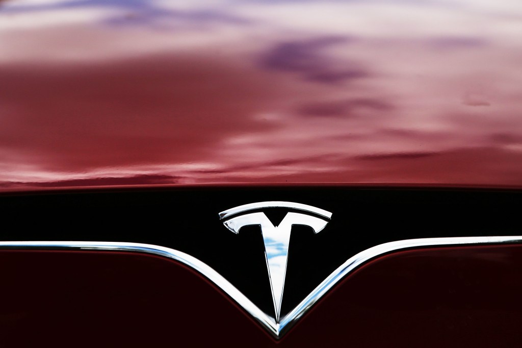 The badge of a Tesla Model S sedan