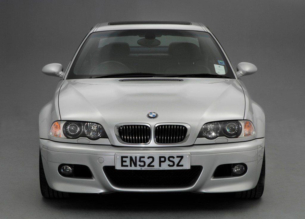 A silver 2002 M3 coupe shot from the front