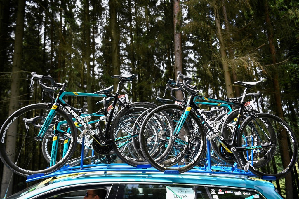 A roof rack full of road bicycles 