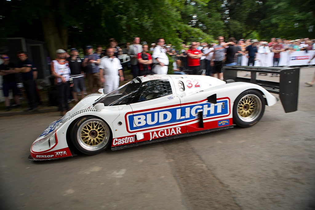 The Jaguar XJR-12D at Goodwood preparing to head up the hill