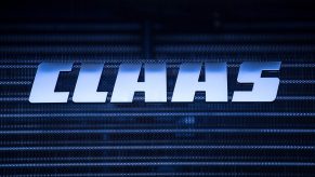 the Claas logo on the grille of a tractor