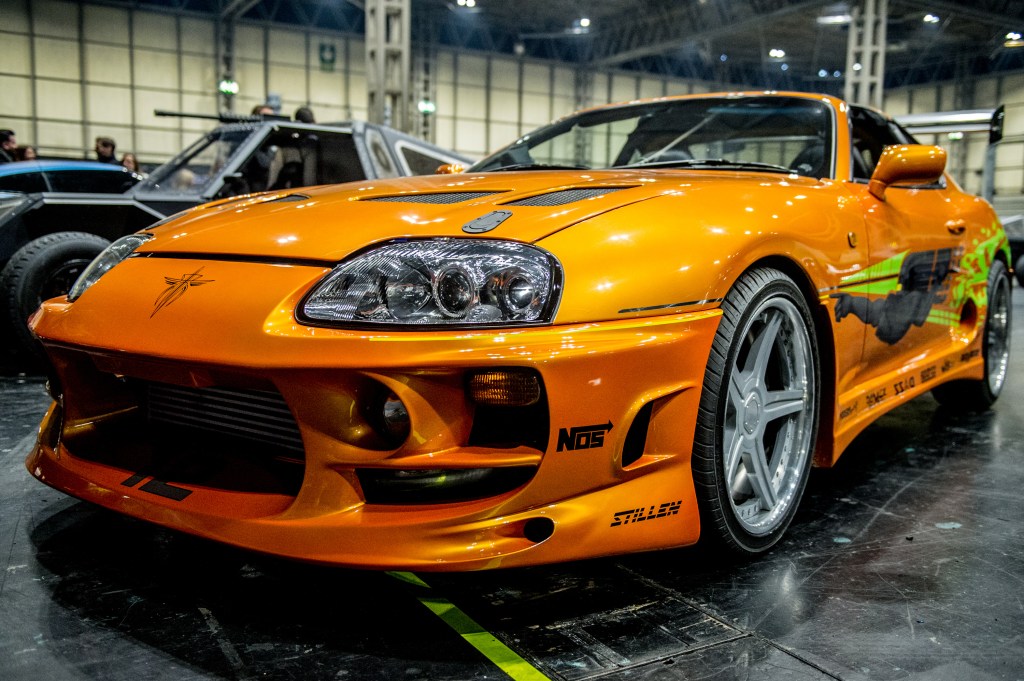 The infamous orange Toyota Supra is what most picture when they think "modified car".