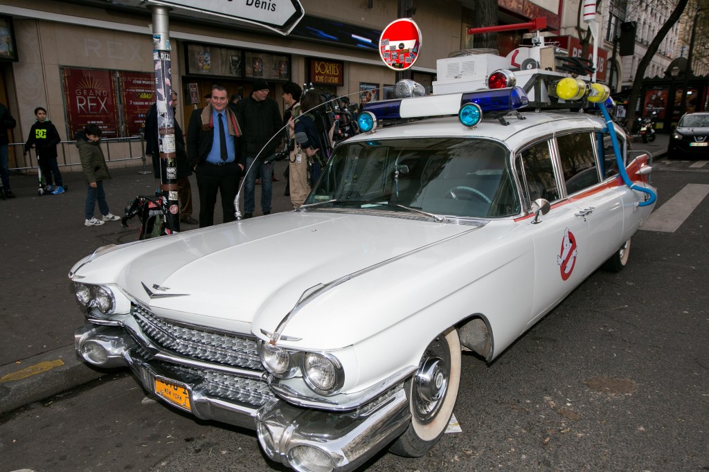 ecto 1 parked in front of a theater