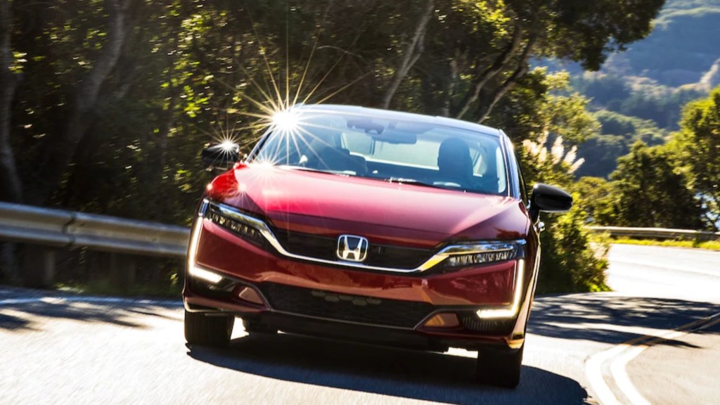 A red 2021 Honda Clarity Fuel Cell hydrogen vehicle. 