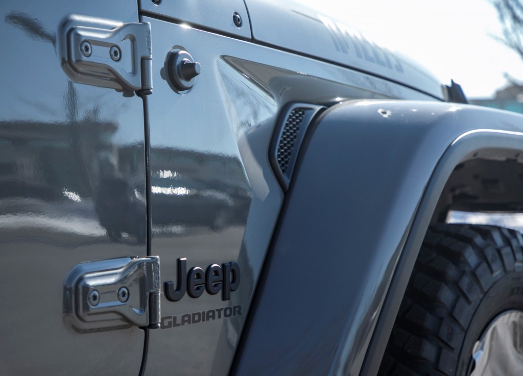 The badging of a Jeep Gladiator pickup truck