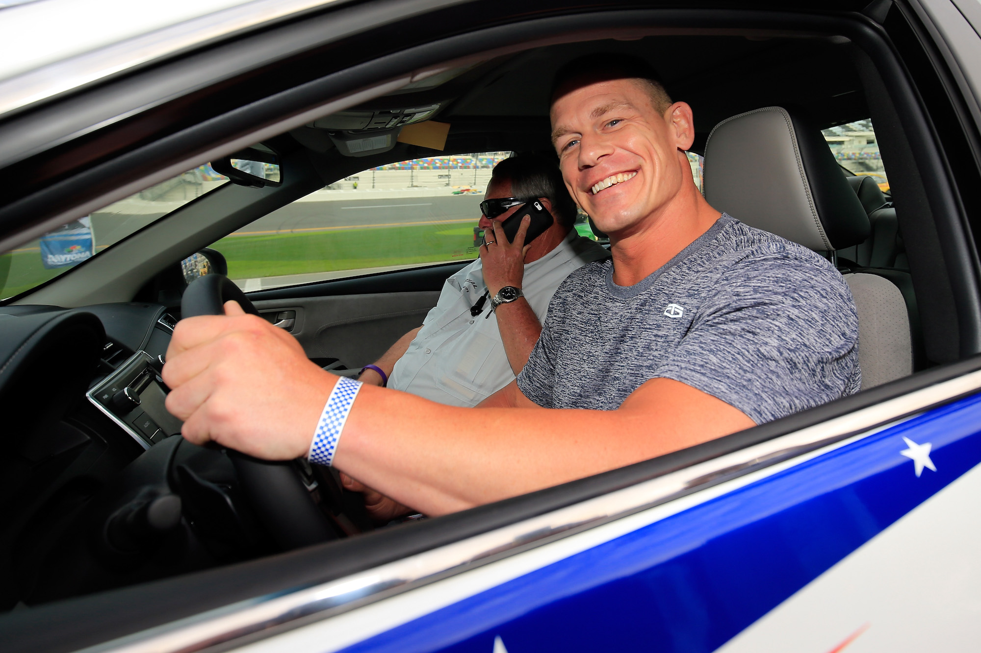 John Cena poses with the pace car before the Daytona 500 at Daytona International Speedway on in February 2016