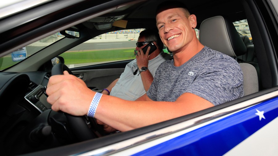 John Cena poses with the pace car before the Daytona 500 at Daytona International Speedway on in February 2016