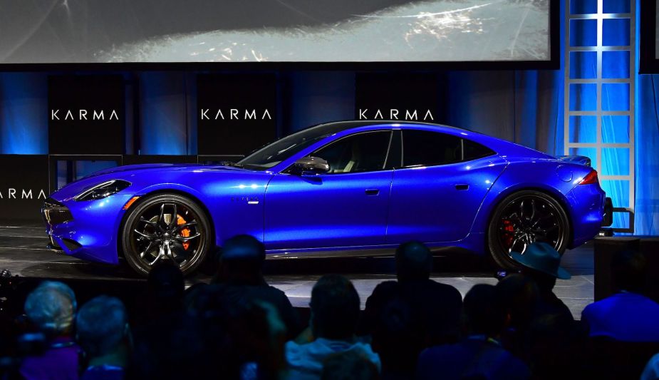 A bright-blue metallic Karma Revero GTS sports sedan at the Automobility LA Technology Pavilion in November 2019
