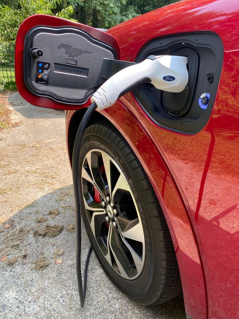 The 2021 Ford Mustang Mach-E charging with a home outlet