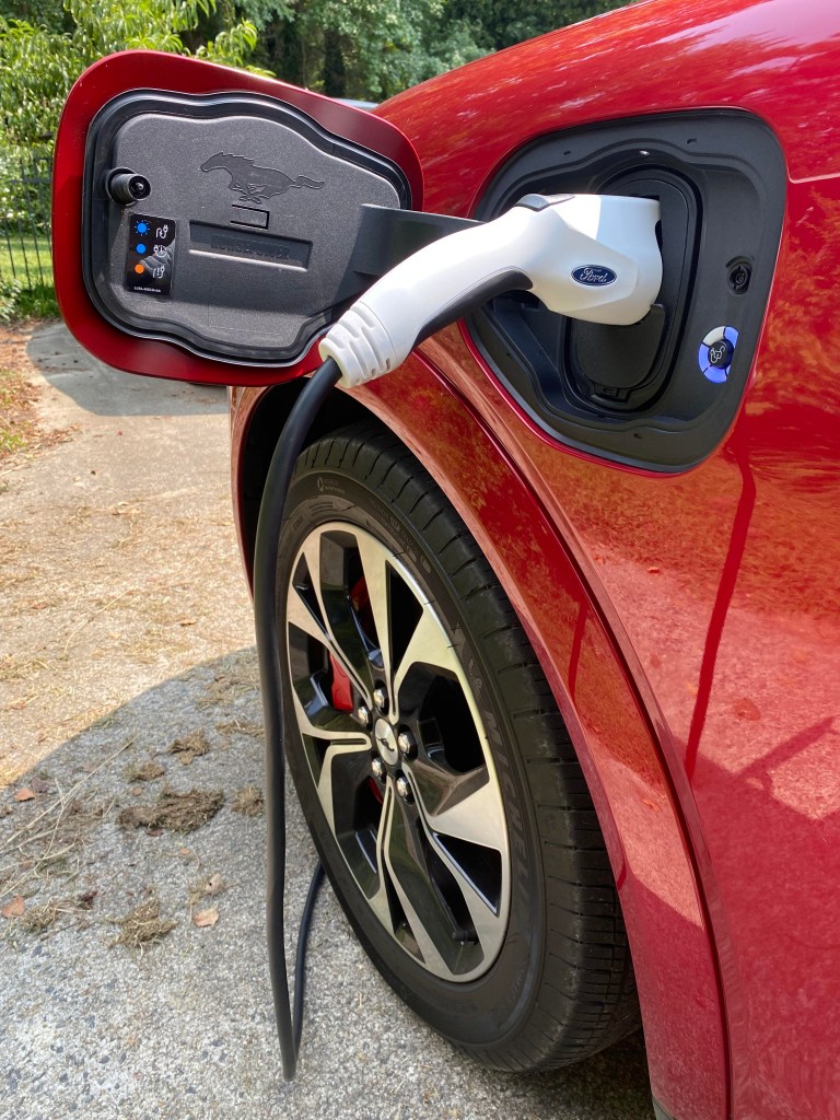 The 2021 Ford Mustang Mach-E charging with a home outlet