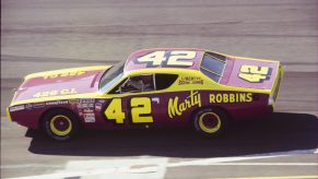 Marty Robbins drives a Dodge Charger to an eighth place finish at the 1972 Miller 500.