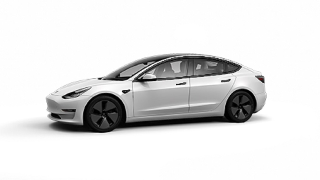A white 2021 Tesla Model 3 against a white background.