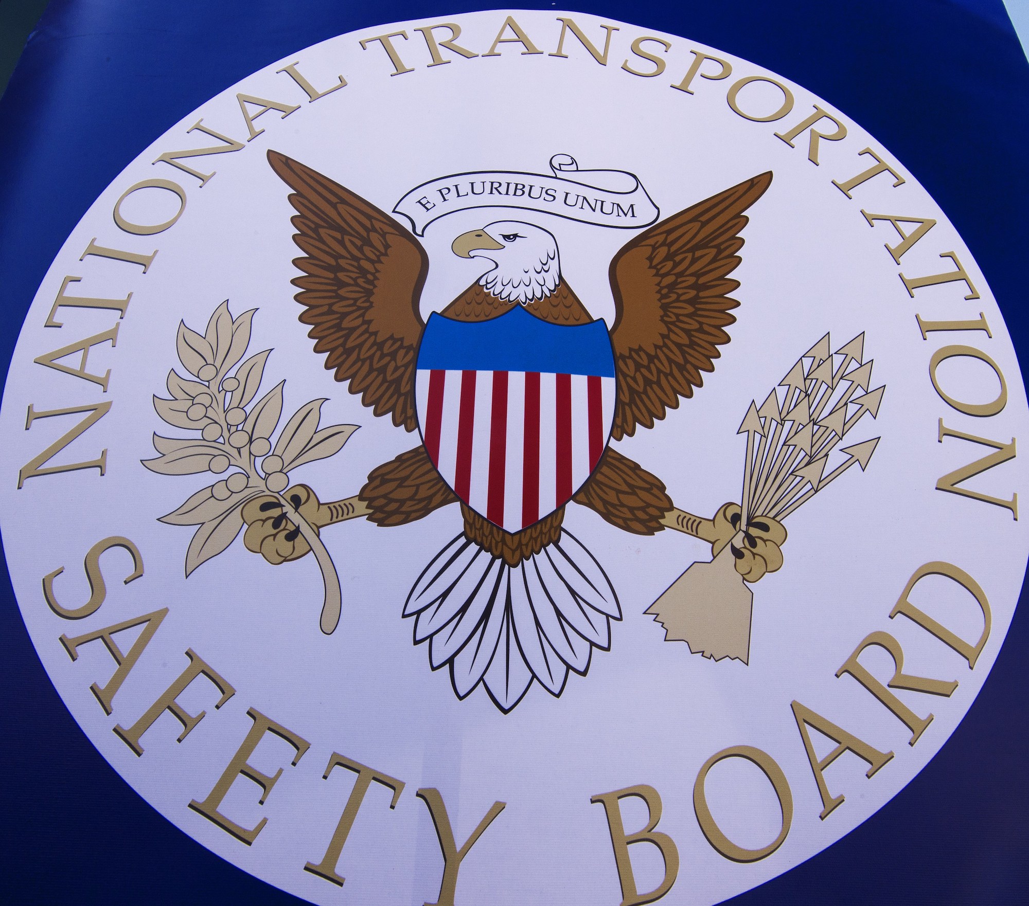 The NTSB seal is seen during a safety event at Trailside Middle School, in Ashburn, Virginia, in August 2015