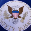 The NTSB seal is seen during a safety event at Trailside Middle School, in Ashburn, Virginia, in August 2015